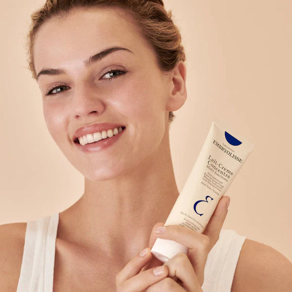 Embryolisse Lait-Crème Concentré in its signature white and blue tube. The multi-purpose moisturizer trusted by makeup artists worldwide.
